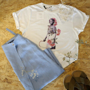 Samarreta unisex de mànega curta TINA Y TONA Florecer. 100% cotó orgànic GOTS. Serigrafiada. Falda.